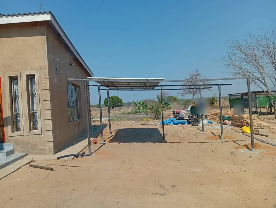 First solar panel fixed to the carport frame